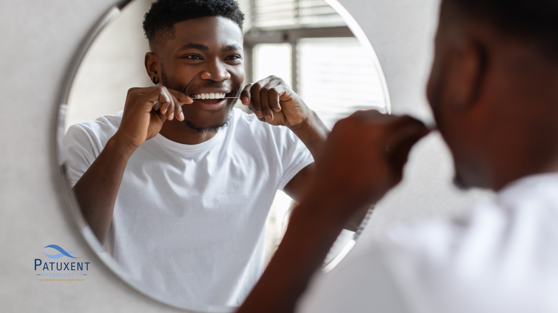 Man flossing with thread