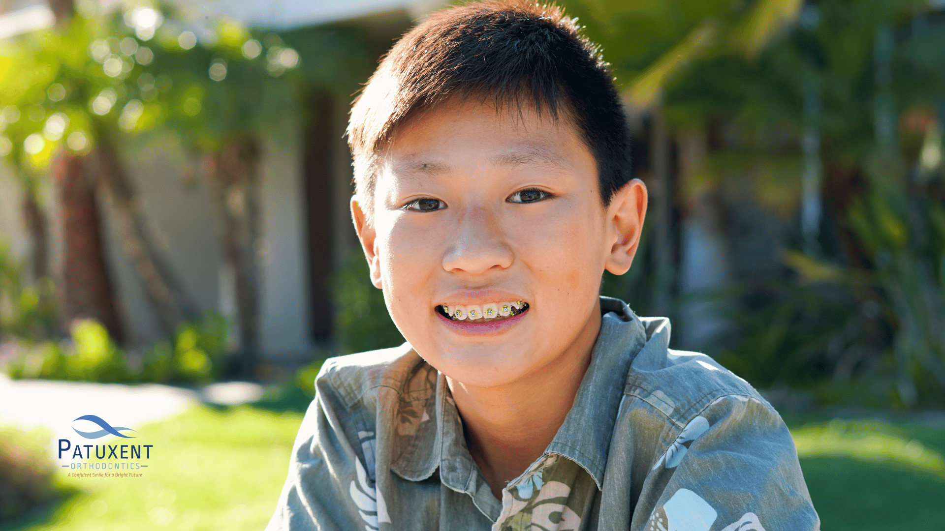 boy with braces smiling