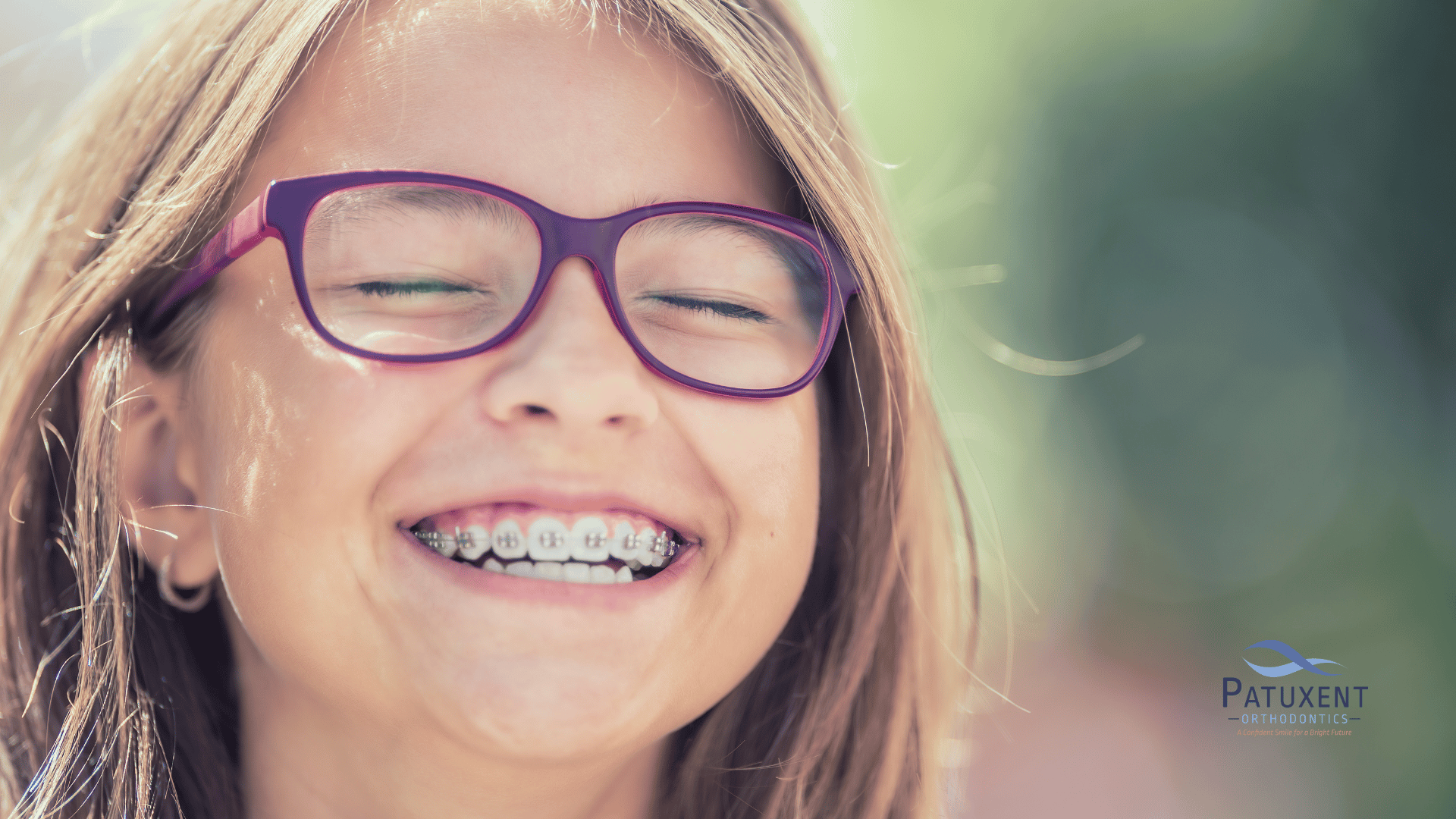 kid with braces smiling