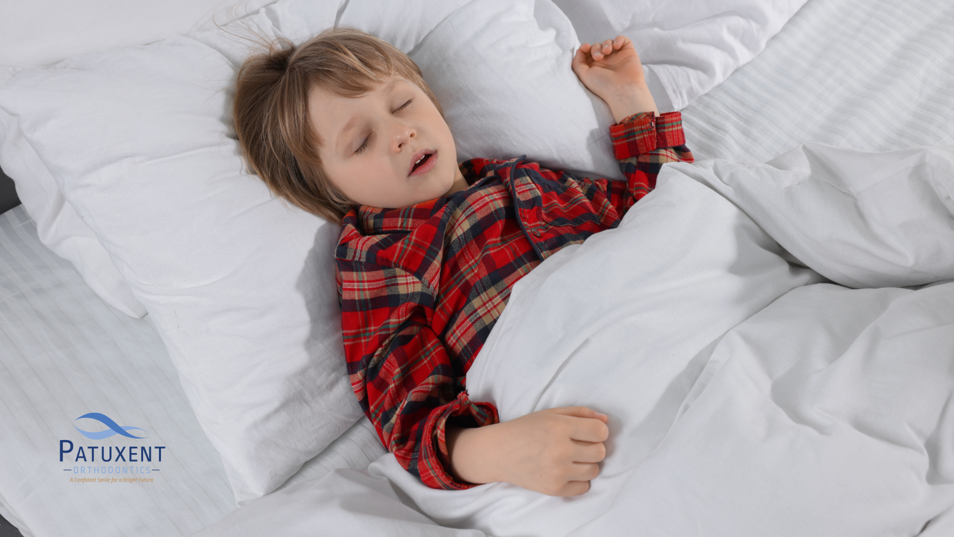 This is an image of a young boy sleeping This is an image of a young boy sleeping